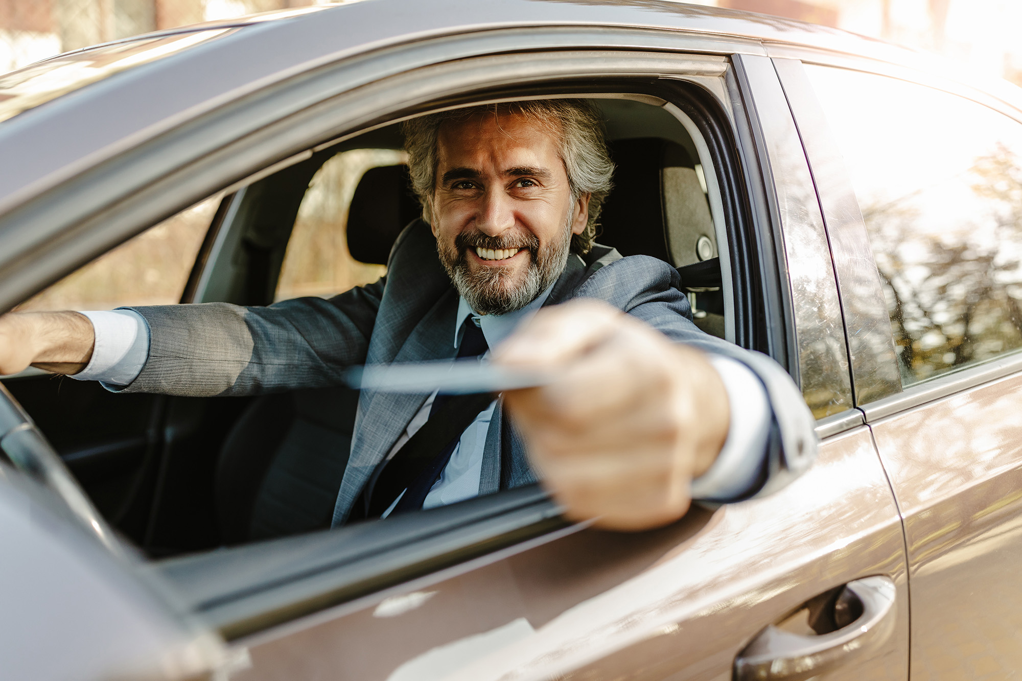 Ticket Based Parking Person holding parking ticket in Car